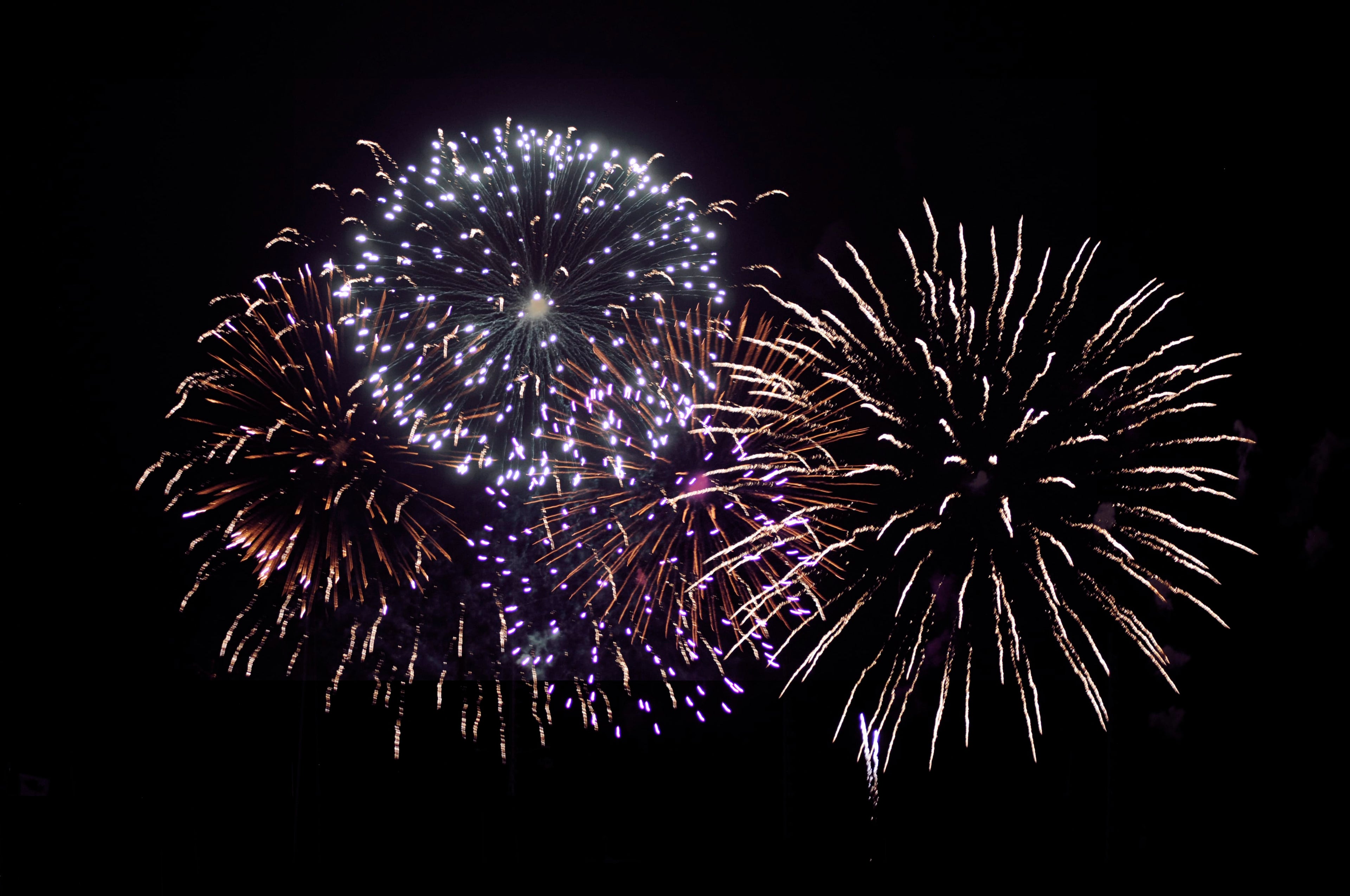 Five fireworks exploding in the sky